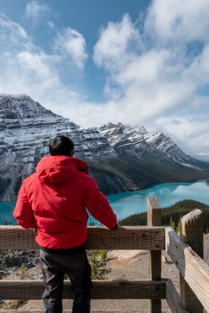 Man standing and looking the view of Peyto lake at Banff national park